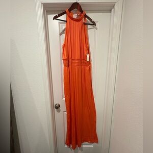 Anthropologie orange jumpsuit never worn tags attached M- Tall